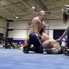 Marty Clay locks his opponent into a vicious arm-bar.
